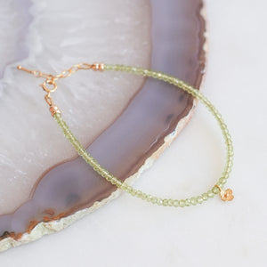 Peridot beaded bracelet with 18k Solid Gold Charm