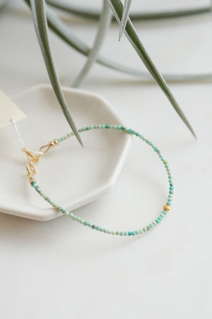 Turquoise beaded bracelet with 18k Solid Gold Bead