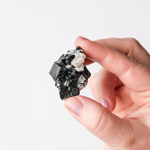 Schorl (Tourmaline) cluster on Quartz