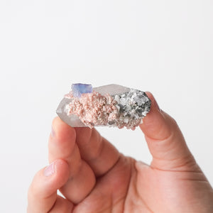 Rhodochrosite and Fluorite on Quartz