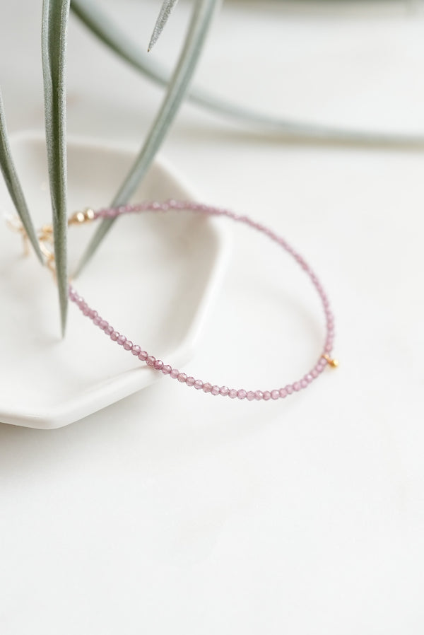 Pink Rhodolite Garnet beaded bracelet with 18k Solid Gold Bead